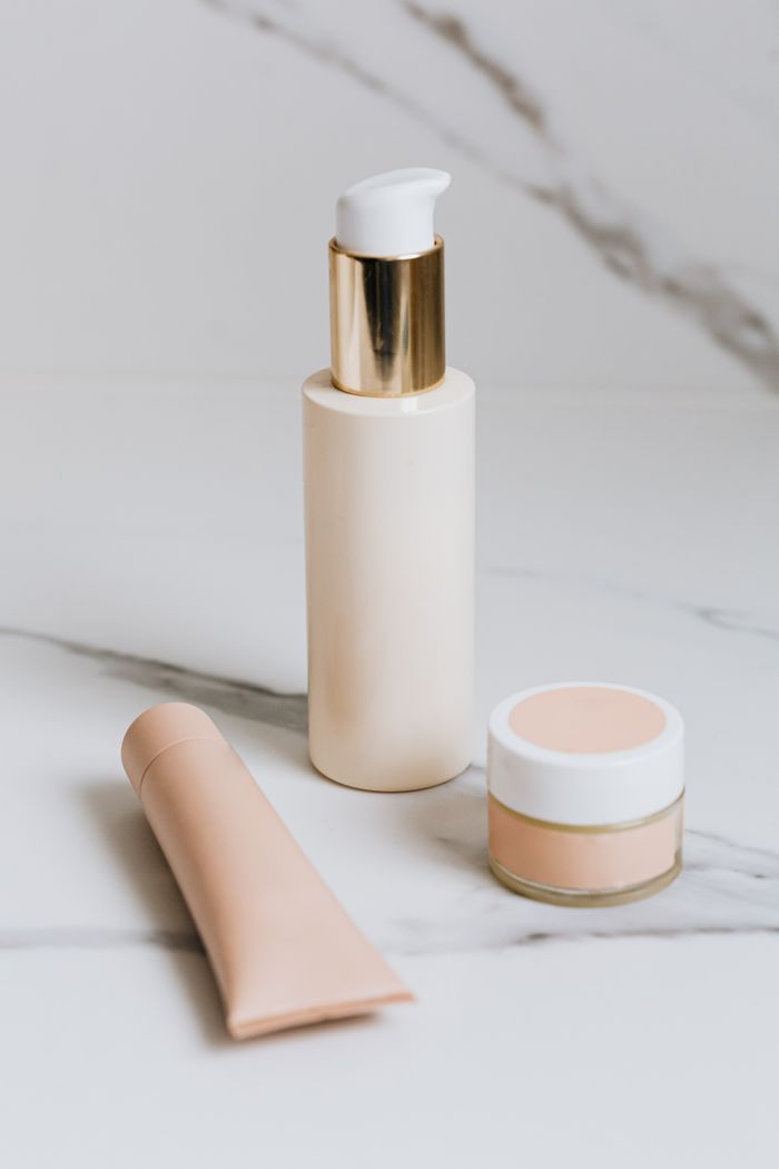 gallery-01 Luxurious skincare products elegantly arranged on a marble surface, showcasing beauty essentials.